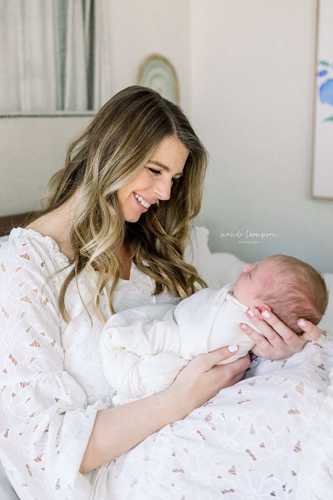 Sleepy Newborn baby snuggled up during Houston Newborn session