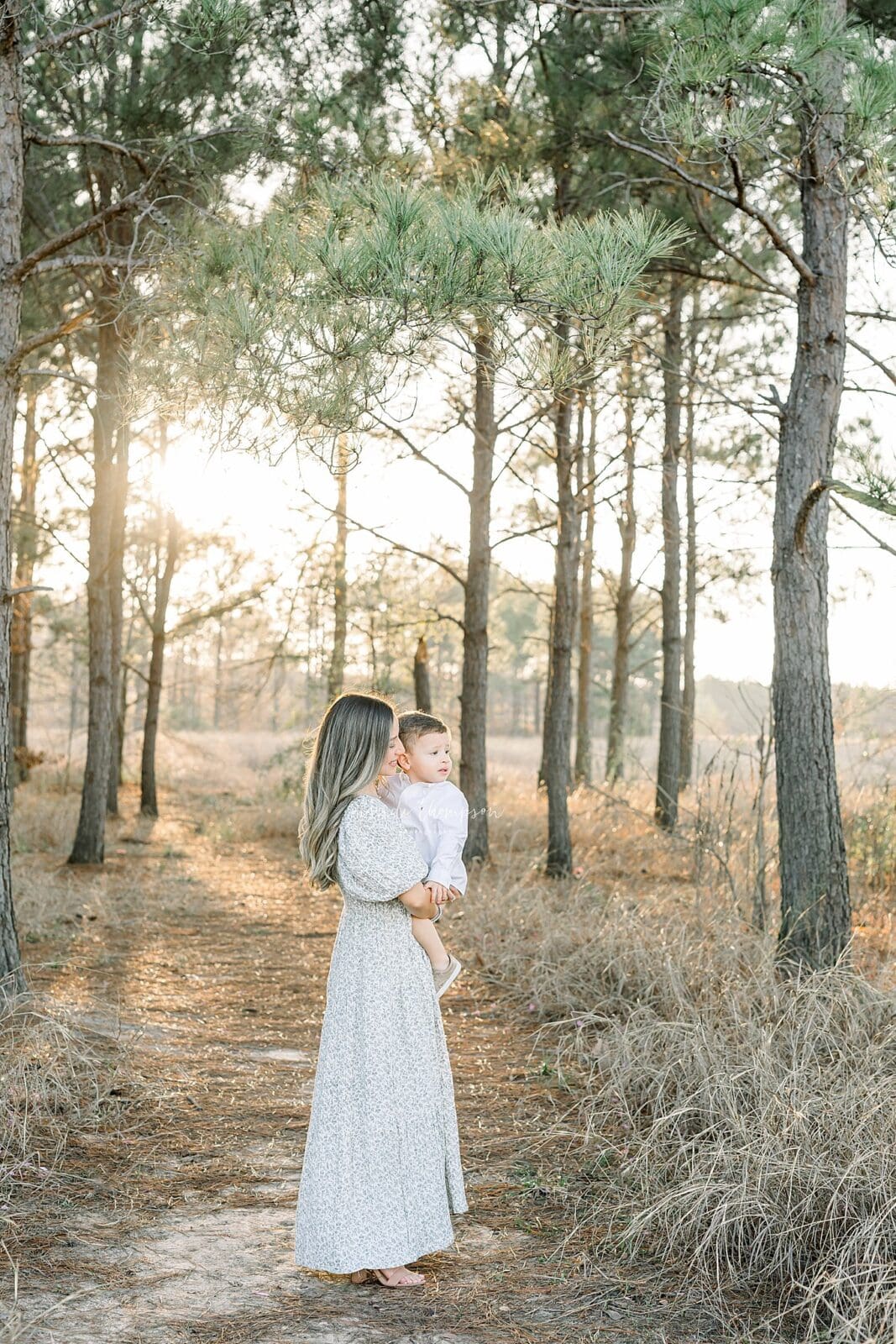Outdoor luxury family session in Katy, TX at sunset capturing timeless, natural, and connection-filled moments.