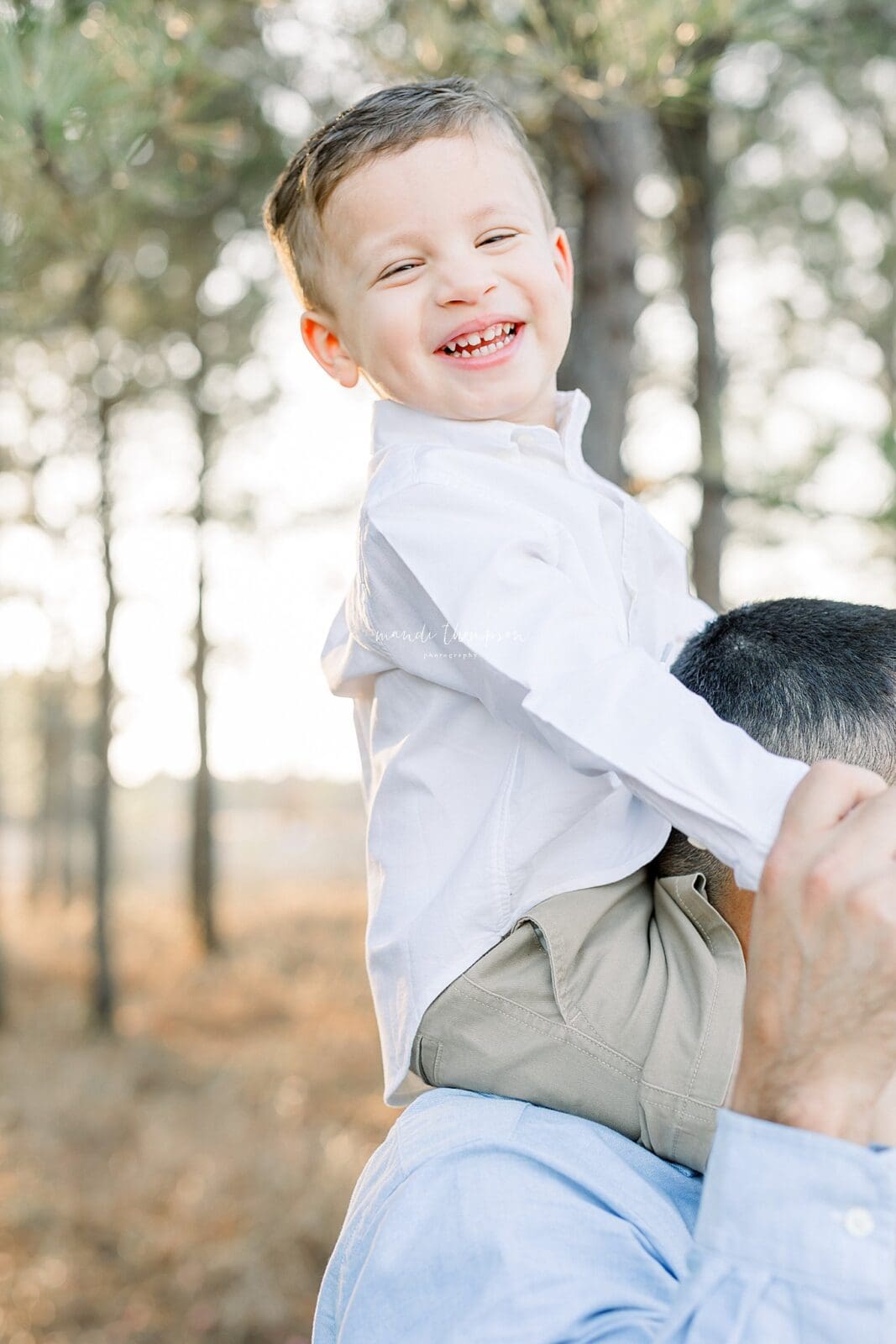 Katy, Texas family enjoying a sunset lifestyle session with warm golden hour light and authentic smiles.